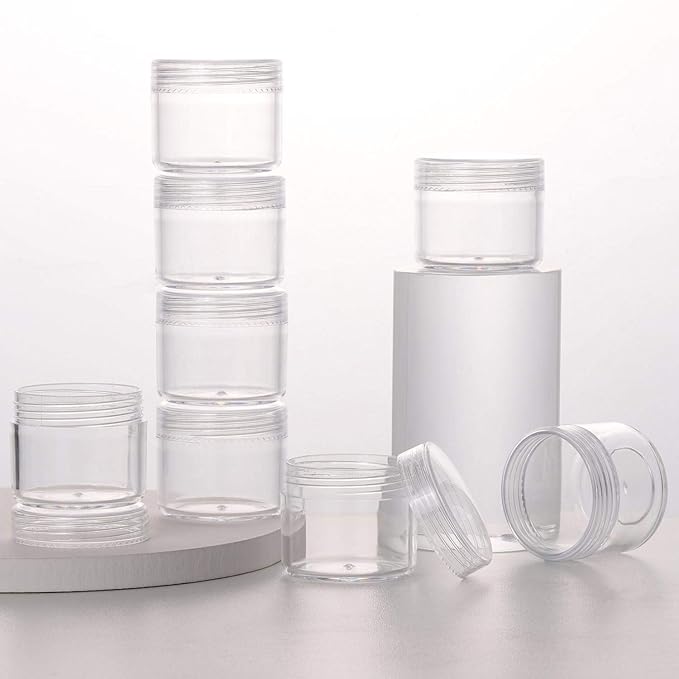 Refillable Cosmetic Sample Jars - 100 Pack 20g (0.7oz) Clear Small Travel Containers with Lids + 10 Mini Makeup Spatulas - BPA Free